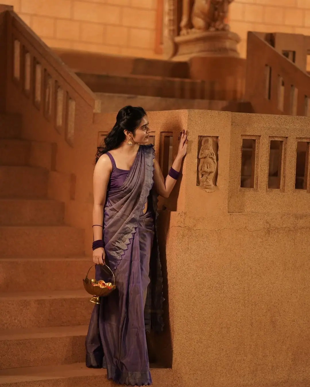 Kushita Kallapu In Traditional Violet Saree Sleeveless Blouse